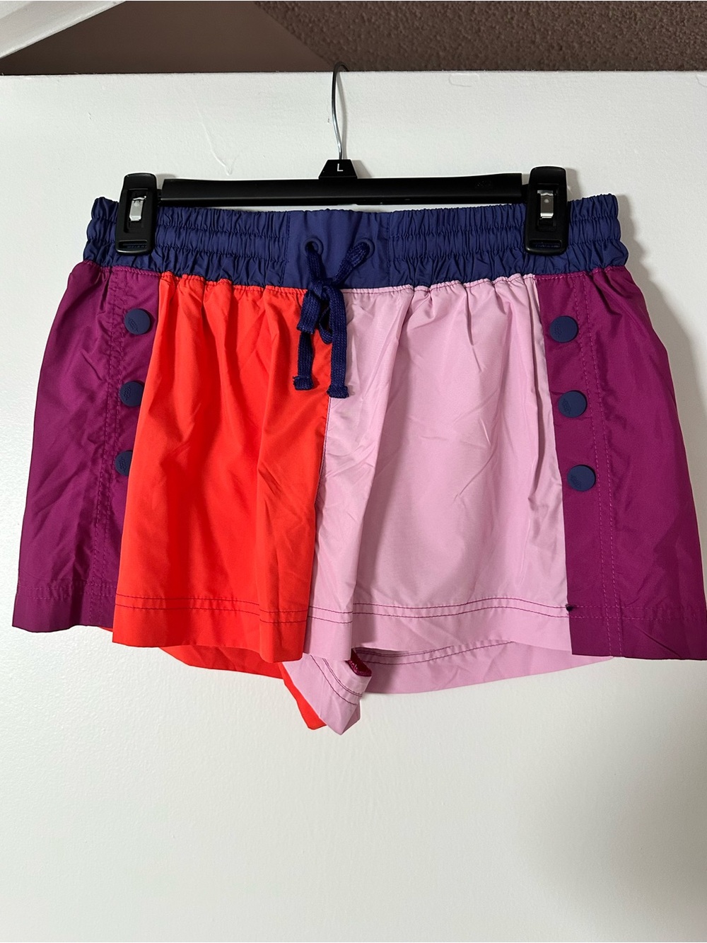 Free People Colorblock Athletic Shorts in Navy, Purple, Pink, and Orange